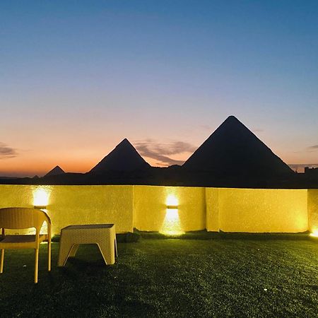 Isis Pyramids View Inn Kafrat al Jabal Bagian luar foto