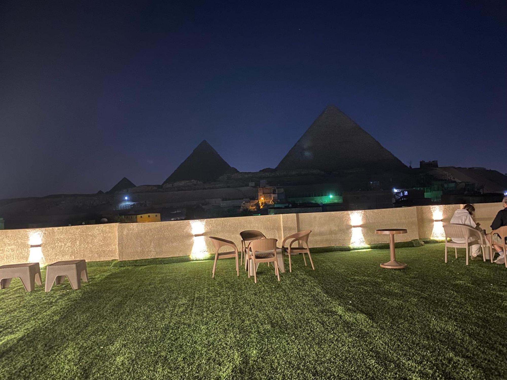 Isis Pyramids View Inn Kafrat al Jabal Bagian luar foto
